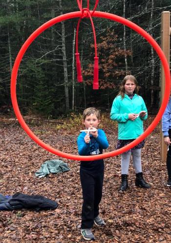Ryder Baker goes for gold at the Shoot the Hoop station. JENNY BENNETT/Boothbay Register