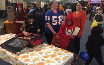 New York Giants Linebacker “Lawrence Taylor” filled her sack with candy, not quarteracks, during Trunk or Treat. BILL PEARSON/Boothbay Register