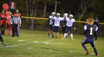 Instead of running a deep pattern, Boothbay receiver Michael Hollowell throws long on a flea flicker. BILL PEARSON/Boothbay Register