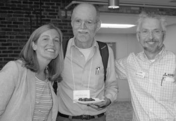 2018 Efficiency Maine Symposium after Rockland received the Trust's highest award for energy efficiency work. From left are Bridget Doxee, residential program manager for Efficiency Maine: Larry Pritchett, former chair of Rockland Energy Committee; and Dana Fischer, Mitsubishi Electric. Courtesy of Larry Pritchett