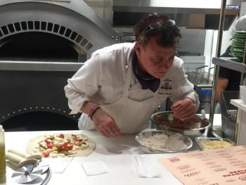 Ports Pizzeria co-owner Francesco Mazzone prepares a pie Nov. 10 during the new restaurant’s “soft” opening. BILL PEARSON/Boothbay Register