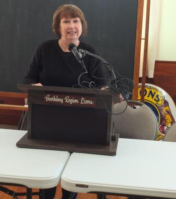 Boothbay Region Lions member Karen Nickerson stands at the podium in the club’s new meeting place in East Boothbay. BILL PEARSON/Boothbay Register