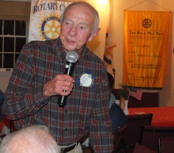 Bob Devine explains his military service Nov. 7 during Boothbay Harbor of Rotary Club’s annual Veterans Day Dinner. BILL PEARSON/Boothbay Register
