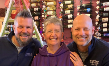 Mark Osborn and Buzz Makarewicz with Kim Martin of Eventide Specialties, getting ready for this weekend’s book signing and another on Men’s Night. Courtesy photo