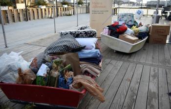 The Midcoast Humane boat (forefront) and the Boothbay region schools’ Clothing Closet boat are both filled chock full at the fourth annual Fill the Boat With Love event Dec. 29. LISA KRISTOFF/Boothbay Register