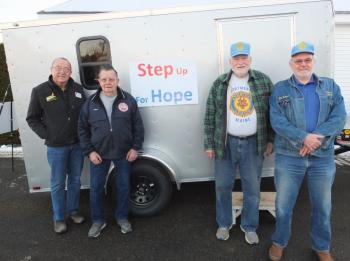 A trio of local veterans showed American Legion Post No. 36 Commander Dave Patch, left, on Jan. 1 a mobile shelter designed to temporarily house homeless veterans. Pictured: second, from left, Arthur Richardson, Ed Harmon and John Hargreaves. BILL PEARSON/Boothbay Register