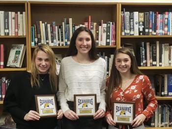 Holding plaques they received at the BRHS girls basketball awards ceremony March 2 are, from left, Kylie Brown, most improved player; Glory Blethen, most valuable player; and Chloe Arsenault, coach’s award. Courtesy of Brian Blethen