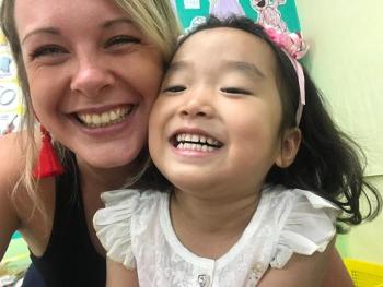 Happy teacher Alexandra Clarke with an equally happy student. Courtesy of Alexandra Clarke