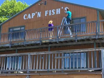 The Cap’n Fish’s sign comes down. Courtesy of Bob McKay
