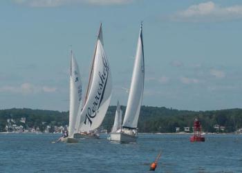 Faster and bigger boats chasing the fleet to the first mark. Courtesy of Jon Dunsford