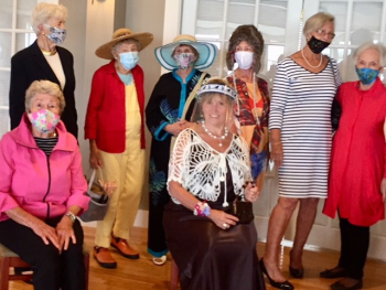 Some of the 15 fashion show models featuring attire from our Thrift Shop. From left are Penny Thumith and Abby Shaw (seated); back, Patty Colhoun, Arlene Smith, Judy Boyes, Sally Eastwood, Lucinda Sanborn and Joanne Annino. Dan Zajdel photo