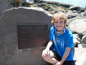 Quillan Morrison, 8 year-old-son of David and Trina Morrison, summer residents on McKown Point, at the Rachel Carson memorial. Courtesy of Marion Coleman