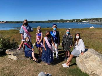 From left are Miss Windjammer winners and King of the Harbor: Sarah Harris (2018), Sophia Mansfield (2018), Alana LaCourse (2019), Scout Martin (2020), Spencer Pottle (2018), Suzie Edwards (2017), and Emerson Harris (2016). Emily Mirabile photo