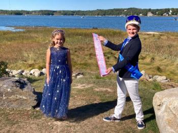 Reigning King of the Harbor, Spencer Pottle, congratulates Scout Martin with the Miss Windjammer 2020 sash. Emily Mirabile photo
