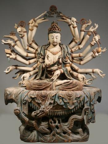 An important 15th Century Sino-Tibetan carved and painted figure of Guanyin “1000 Arms,” brought $84,000. Courtesy of Carol Achterhof Guanyin