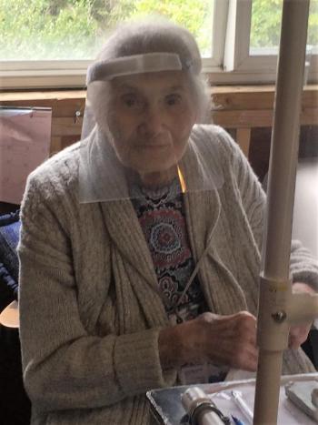 Moore at work in the gift shop at Cabbage Island. LISA KRISTOFF/Boothbay Register