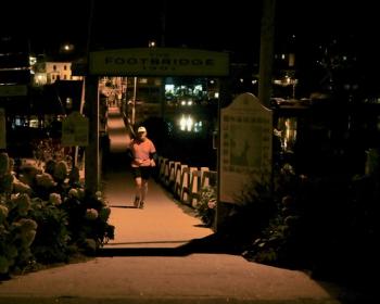 Tom Cotter about to cross the finish line. Bob Crink photo