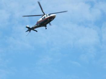 A landscaper is transported by Lifeflight of Maine on Oct. 6 to Maine Medical Center after his weed trimmer came apart. BILL PEARSON/Boothbay Register