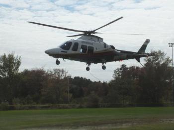 A Lifeflight of Maine helicopter lands Oct. 6 at the Boothbay Region High School football field to transport an injured landscaper working on Southport to Maine Medical Center. BILL PEARSON/Boothbay Register