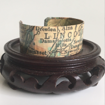 Cuff bracelets made from old charts and maps by Whimsy’s Mira Coleman will be among the unusual items for sale in the Holiday Gift Shop, 75 Main St., during Wiscasset Holiday Marketfest Dec. 4-6. Photo courtesy of Mira Coleman