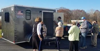 Pemaquid Chapter members take a tour of the V.E.T.S. trailer with Ed Harmon and Arthur Richardson at the Nov. 10 meeting. Courtesy of Audrey Miller