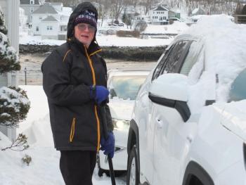 Boothbay Harbor resident Phil Chapman was one of the many locals on Dec. 18 digging out after the season’s first major snowstorm. BILL PEARSON/Boothbay Register