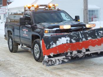 Boothbay Harbor had its plow trucks cleaning up the morning of Dec. 18 following the season’s first major snowstorm. BILL PEARSON/Boothbay Register