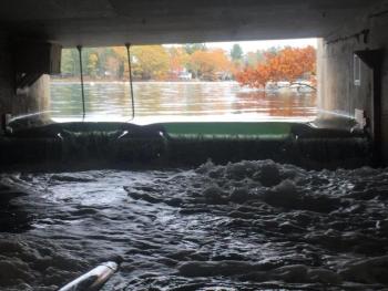 View through culvert showing saltwater from the harbor over-topping dam and entering the Pond, Oct. 16, 2020. Jason Bartlett photo