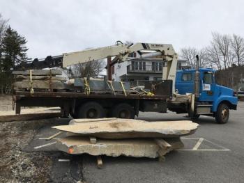 Stones being delivered March 25 to the Eastside Waterfront Park for construction of the tidal access feature of the park. These stones along with the existing rip rap will constitute a sea wall and a place for people to get down to the water on the north side of the park. Courtesy of Boothbay Harbor Waterfront Preservation