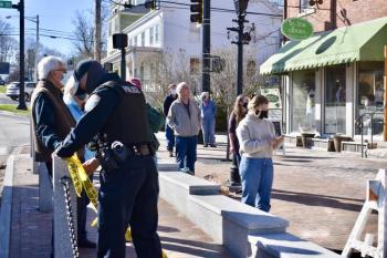 People gather on Main Street to see the damage to the Wawenock building. PHIL DI VECE/Wiscasset Newspaper