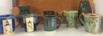 One shelf of completed projects by Stormont and Tan. LISA KRISTOFF/Boothbay Register