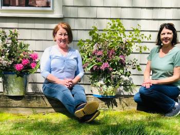 Debbie Moorefield representing the Boothbay Garden Club (right) and St. Andrews Auxiliary President, Laura Zajdel. Courtesy of St. Andrews Auxiliary