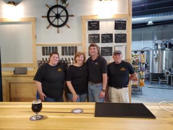 From left are Tanya Gamache, taproom manager, Jean Powers, co-owner, Pepper Powers, co-owner, and Mike Acker, assistant brewer. Photo courtesy Stan Rintz