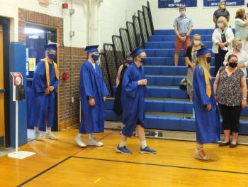 Boothbay Region High School Class of 2021 slowly marches into Class Day to the beat of “Pomp and Circumstance.” BILL PEARSON/Boothbay Register