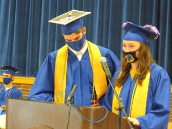 Isabel Harkins presents an optimistic view about the Class of 2021’s time at Boothbay Region High School and Nathan Chatterton counters with a pessimistic one. BILL PEARSON/Boothbay Register