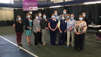 Clinic staff and volunteers bid farewell as infection rate dwindles, vaccination numbers go up and clinic options continue to increase and diversify. From left, Marcy O’Donnell, LincolnHealth President Cindy Wade, Vicky Williams, Kari London, Sara Pinkham, Angela Poland, Jim Herbold, Lori Grinnell, Brooks Betts, Lisa Bowers, Loree Niola, Bev Squillante and Elsa Parson. JOSEPH CHARPENTIER/Boothbay Register