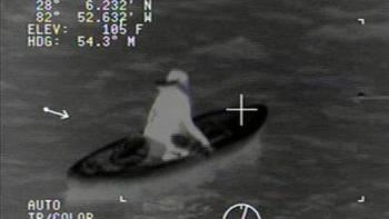 Gulf of Mexico West of Clearwater, FL, April 11, 2016, 10 p.m. local time: An infra-red still image taken from a Coast Guard helicopter video showing a 17-year-old girl being rescued after four hours adrift after she lost her paddle due to a boat wake and became separated from her companions, disoriented and hypothermic. US Coast Guard photo.
