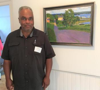Anthony Watkins of Rockland with his Best in Show award-winning oil painting “Tucker Hill View.” Courtesy of Maine Art Gallery Artist Anthony Watkins