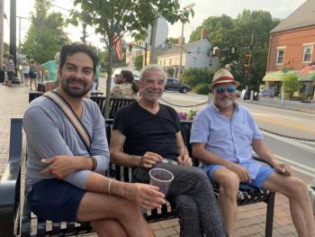 From left, Philip Hannel and Tim Womboe, both of Houston, Texas, and Chris Erickson of Wiscasset take in the Aug. 26 Wiscasset Art Walk. SUSAN JOHNS/Wiscasset Newspaper