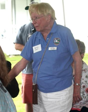 Bunny Gagne stands as she is recognized by Elaine Jones for being the longest reigning volunteer, and an original KBIL board member, at the bicentennial event. STEVE EDWARDS/Boothbay Register