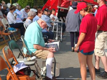 Howard Wright waits patiently for the Southport Firemen’s Auction to begin on Aug. 21. BILL PEARSON/Boothbay Register