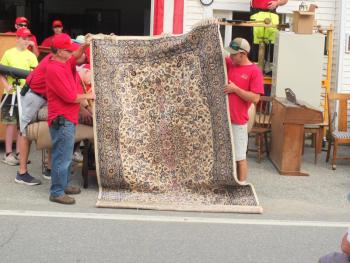 If you are looking for an oversized rug, the Southport Firemen’s Auction was the place to be on Aug. 21. BILL PEARSON/Boothbay Register