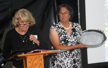 Jean McKay and the KBIL board present Elaine Jones with an engraved silver platter. STEVE EDWARDS/Boothbay Register