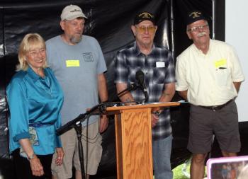 Gov. Janet Mills and the three former lighthouse keepers in attendance, from left: Steven Pitchford, Henry Sieg and Randy Griffins. STEVE EDWARDS/Boothbay Register