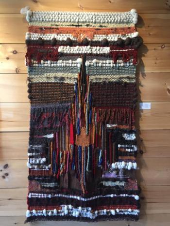 “Earth Mother.” Priscilla Alden. 64” x 35” - wool warp, wool and silk weft. Priscilla May Alden