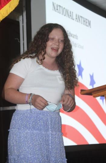 Suzannah Edwards responds to the overwhelming applause after she sings the National Anthem a capella at the bicentennial celebration. STEVE EDWARDS/Boothbay Register