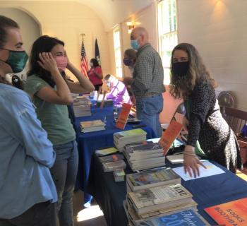 Lara Tupper chats with two interested readers. LISA KRISTOFF/Boothbay Register