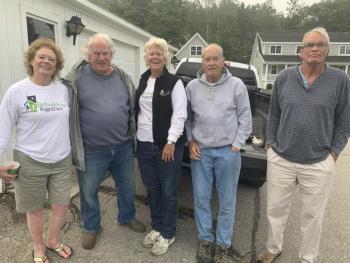 Rebuilding Together-Lincoln County held its annual day promoting maintenance projects on the peninsula on Sept. 25. Pictured, from left, are Sarah Giles, Vic Taylor, Sally Barter, and Alan and Andrew Miller. BILL PEARSON/Boothbay Register