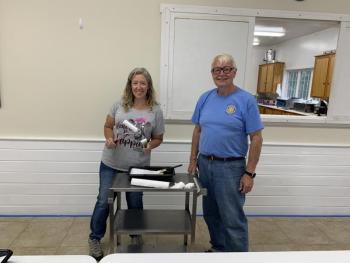 Shawn Lewin and his niece April Smit volunteer Sept. 25 in painting the local legion hall’s interior. BILL PEARSON/Boothbay Register