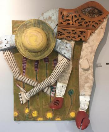 Andre Benoit’s wooden assemblage, “Picking Up Posies.” Andre Benoit